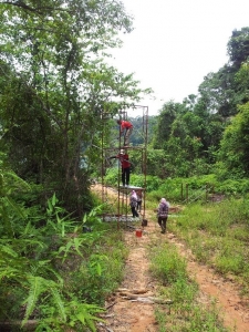 Installation of scaffolding by students for research activities.