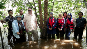 Mr. Joe, Ms. Chuah, Dr. Jamilah and IPK staff posed with critically endangered mangrove tree, Pokok Berus Mata Buaya (Bruguiera hainesii) at Setiu River.